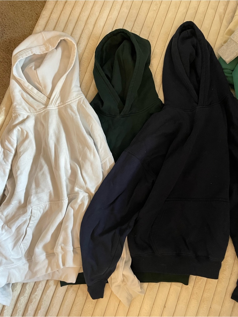 White, Green, Navy hoodies from Bluenotes